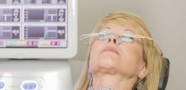 woman getting eye treatment